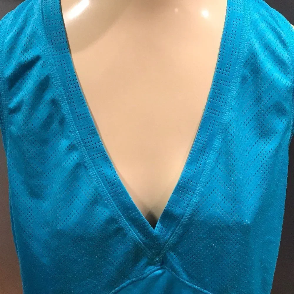 Nike turquoise vented V neck top, medium